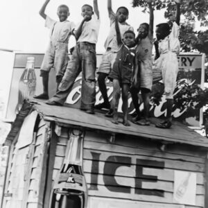 African American Boys with Coca-Cola Sign