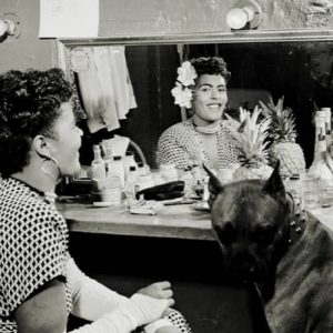 Billie Holiday in Dressing Room with Her Dog "Mister"